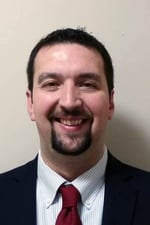 Professional headshot of Gregory Shufeldt