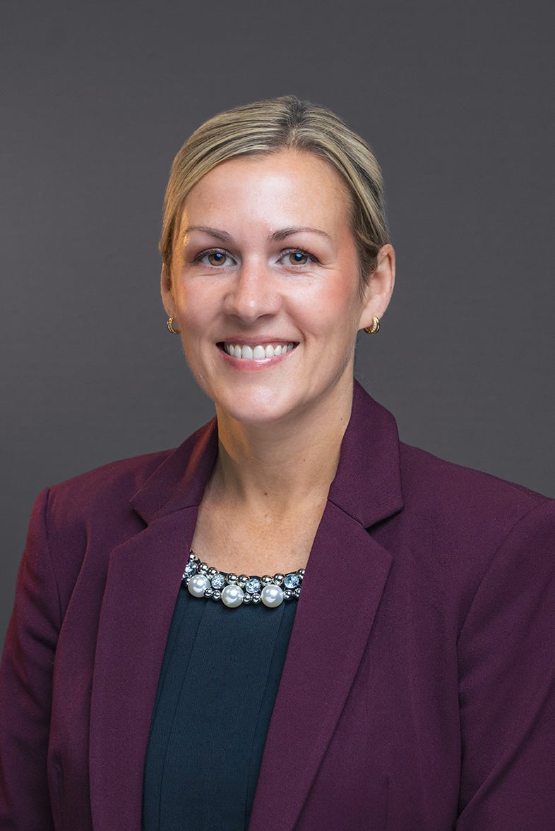 Professional headshot of Kelly Arney