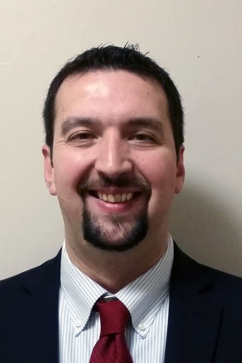 Professional headshot of Gregory Shufeldt